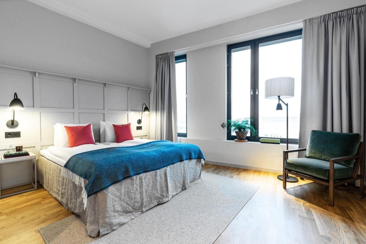 Biz Apartment Bromma Estocolmo Exterior foto A room at the hotel