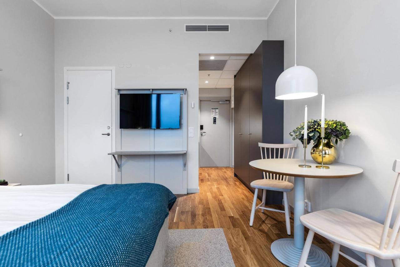 Biz Apartment Bromma Estocolmo Exterior foto A room at the hotel