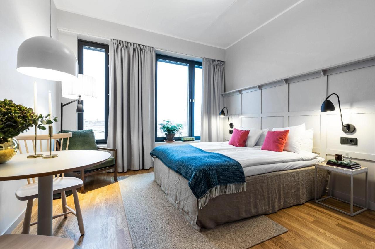 Biz Apartment Bromma Estocolmo Exterior foto A room at the hotel